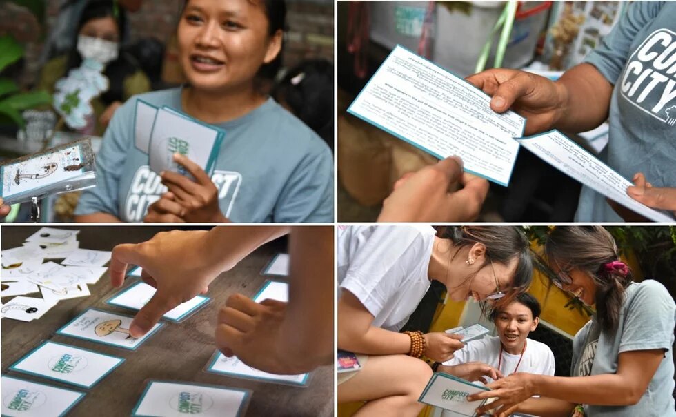Monorom Tchaw and Samnang Heng from the Compost City team interact with visitors using their educational materials at an event organized by Impact Hub in Phnom Penh. 